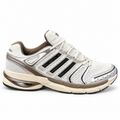 Adidas Adistar Control 5 sneaker in a white, black, and metallic grey/beige