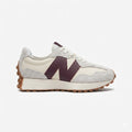 New Balance 327 lifestyle sneakers in the "Moonbeam" or "White/Dark Red" colorway, featuring a unique oversized maroon "N" logo