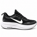 Nike ZoomX black and white cushioned athletic and running sneakers featuring a prominent white Swoosh logo and a thick cushioned ZoomX