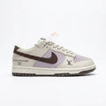 sneakers are custom-made Nike Dunk Lows featuring Louis Vuitton branding and a cream, brown, and lavender colorway