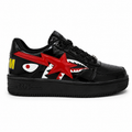 Bathing Ape Bapesta Low sneakers featuring a patent leather shark design in black.