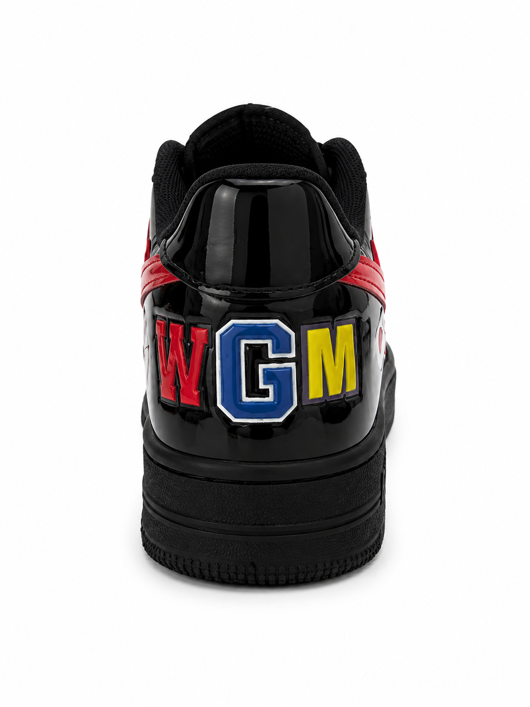 Bathing Ape Bapesta Low sneakers featuring a patent leather shark design in black.