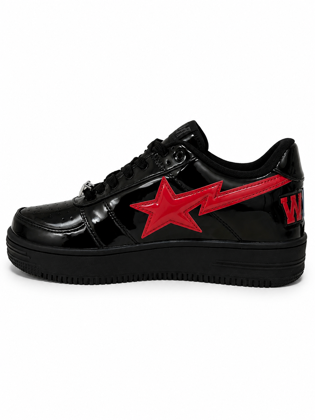 Bathing Ape Bapesta Low sneakers featuring a patent leather shark design in black.