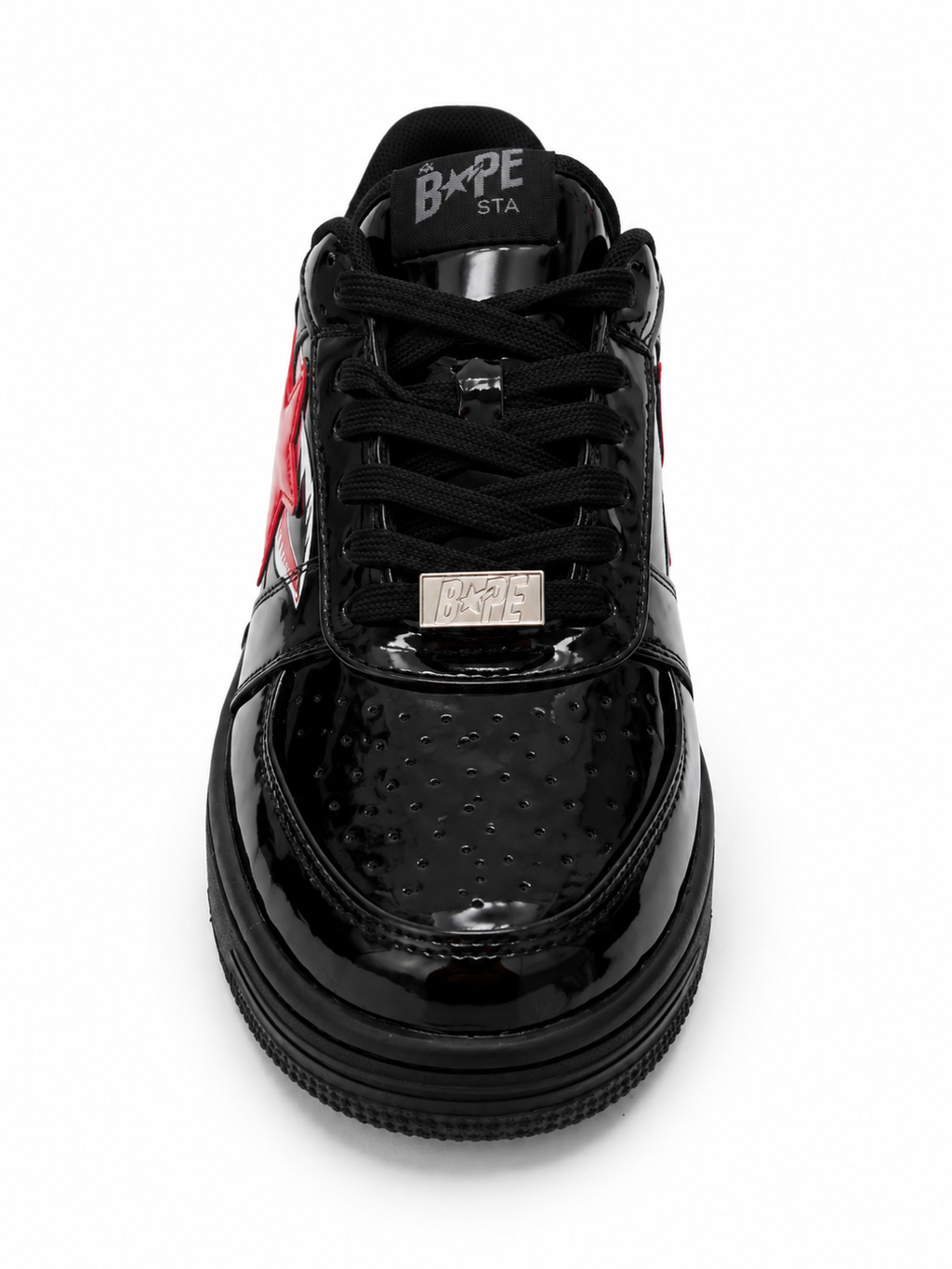 Bathing Ape Bapesta Low sneakers featuring a patent leather shark design in black.