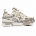 Louis Vuitton LV Skate Sneakers featuring a beige colorway accented with Swarovski crystal details