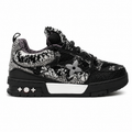 Louis Vuitton Skate trainers feature a black and white design embellished with sparkling Swarovski crystals.