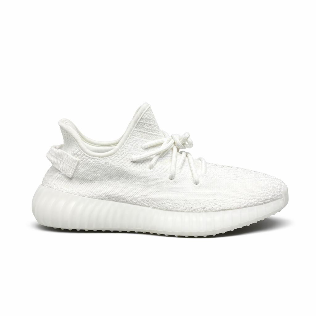 Adidas Yeezy Boost 350 V2 in the "Cream White" or "Triple White" colorway