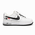 Nike Air Force 1 Low x Supreme x The North Face triple collaboration sneaker in a white and black leather colorway.