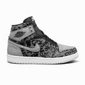 Nike Air Jordan 1 High OG "Rebellionaire" sneaker in a black, white, and particle grey colorway.